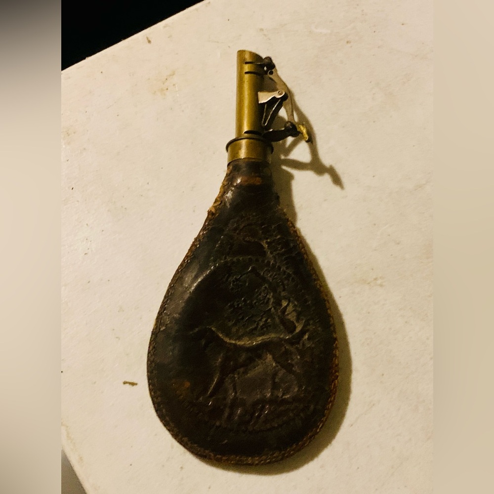 antique American Civil War-era powder flask, likely made by the American Flask